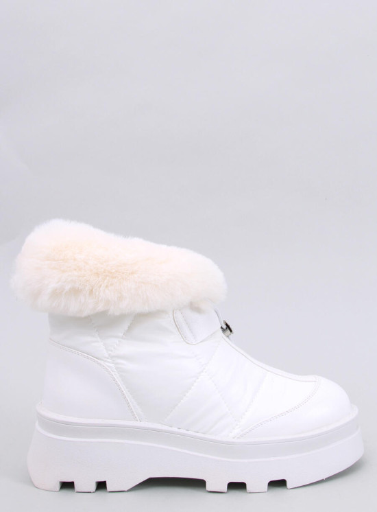 White snow shoes on a high platform