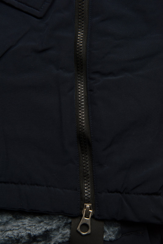 Navy winter jacket with a stand-up collar