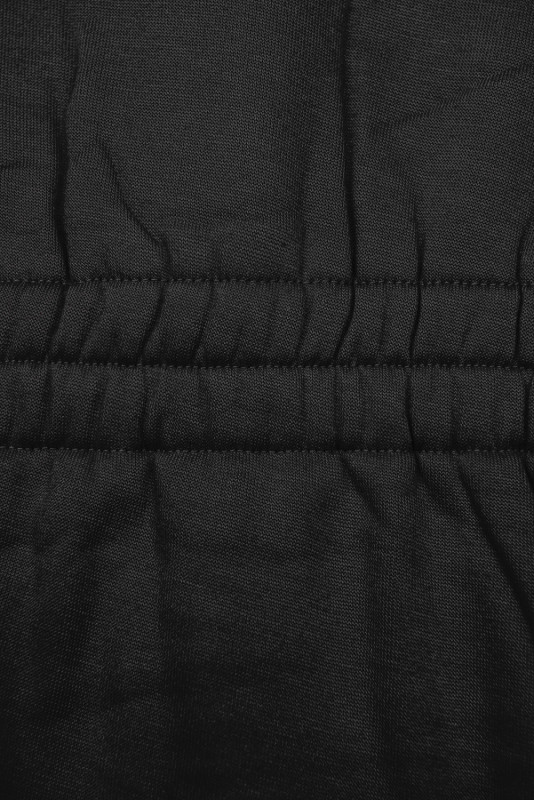 Black elongated hoodie in shaped cut