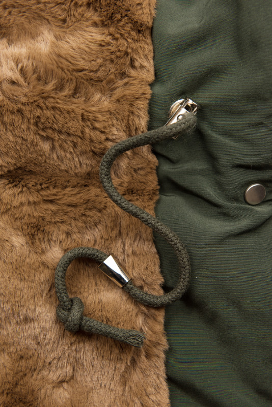 Dark green winter parka jacket with faux fur
