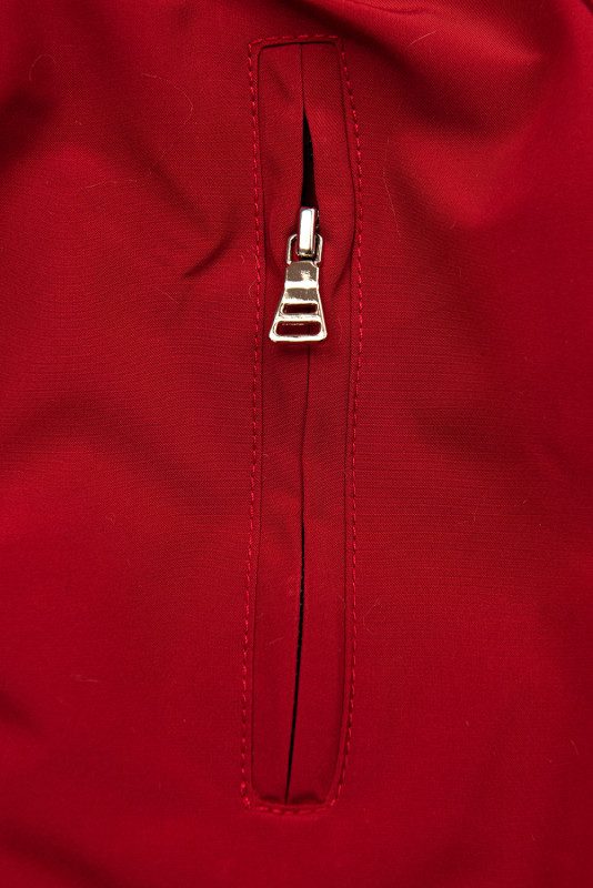 Red parka for winter with black faux fur lining