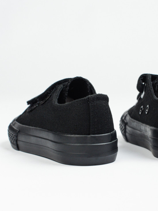 Black children's sneakers with velcro