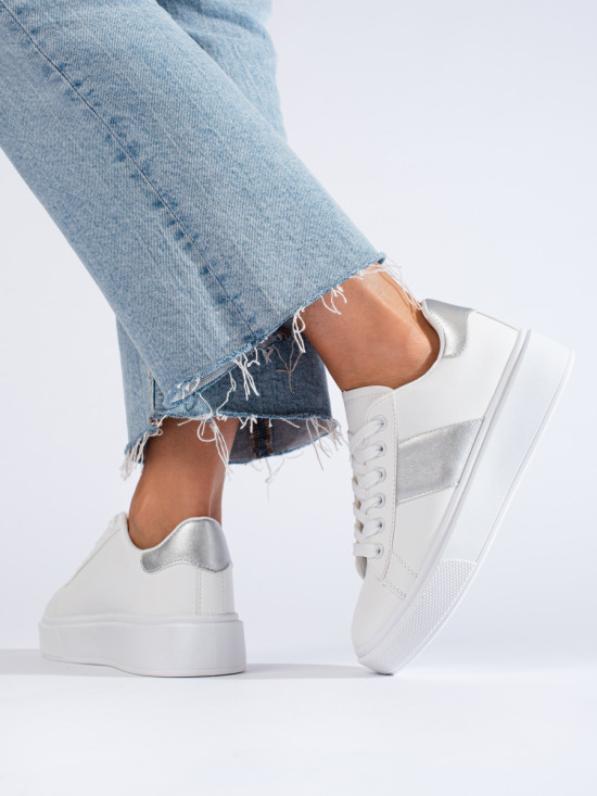 White sneakers with a silver stripe
