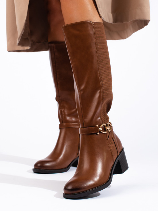 Brown boots with decorative buckle