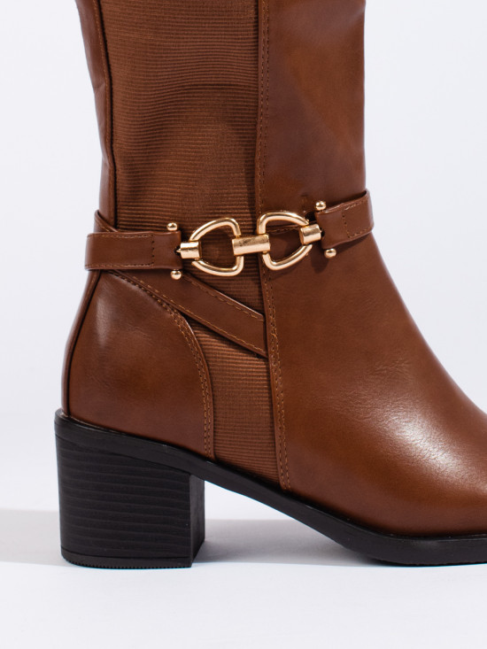 Brown boots with decorative buckle