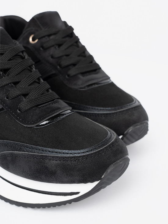 Modern Black Sneakers with Shiny Details