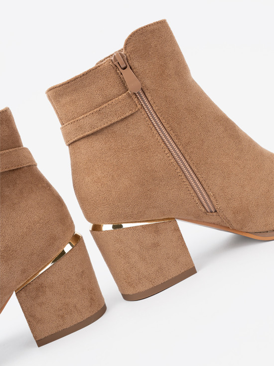 Stylish ankle boots in light brown with golden details