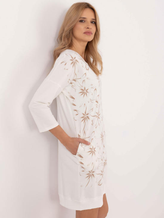 Elegant ecru dress with floral pattern