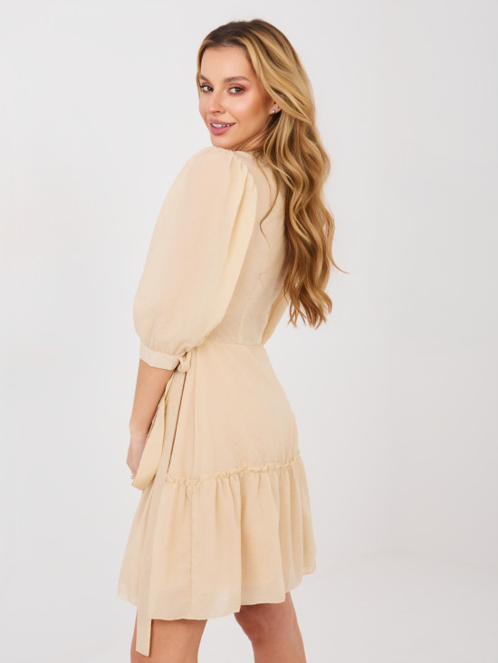 Beige wrap cocktail dress with appliqué