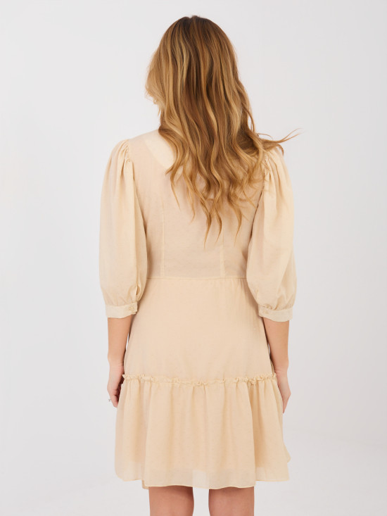 Beige wrap cocktail dress with appliqué
