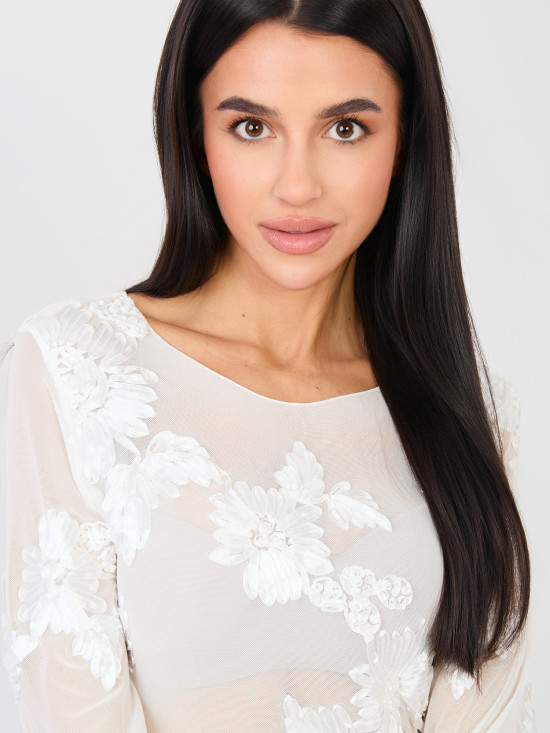 Elegant white blouse with floral appliqué and embroidery