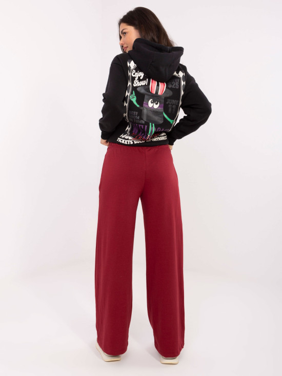 Burgundy sweatpants with wide legs