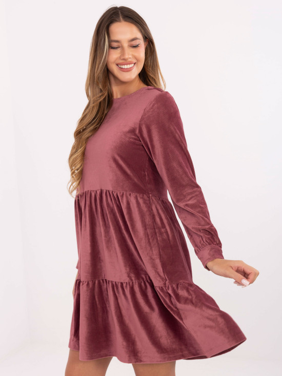 Flared pink dress with ruffle