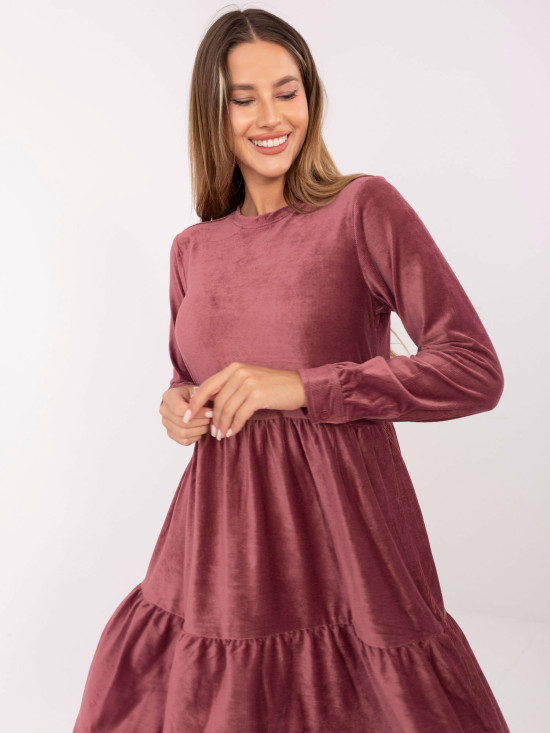 Flared pink dress with ruffle