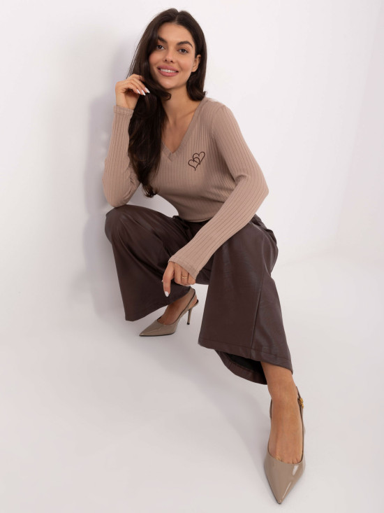 Beige blouse with embroidery and V-neckline