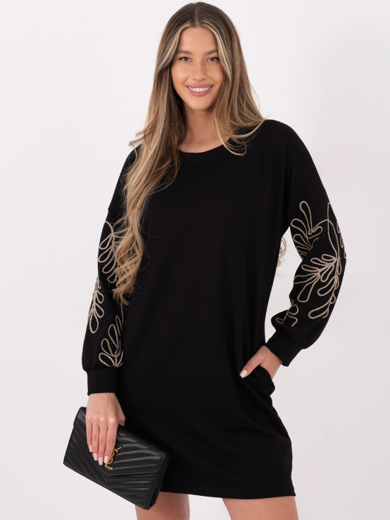 Short black dress with embroidery and puff sleeves