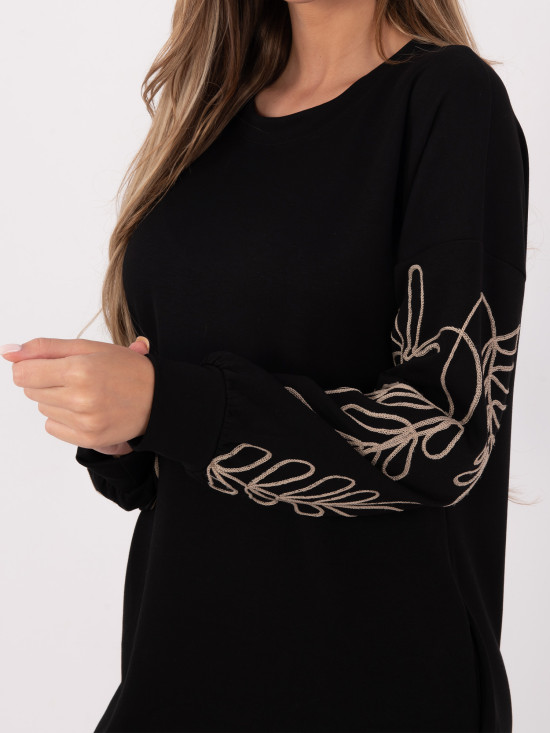 Short black dress with embroidery and puff sleeves