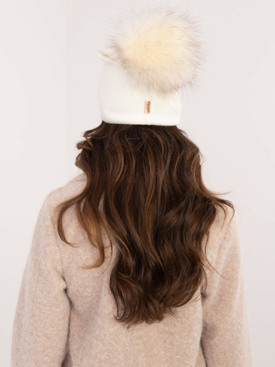 Elegant ecru beanie with pompom