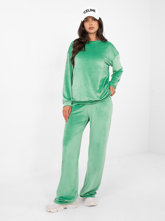 Women's green set with long sleeves and decorative details
