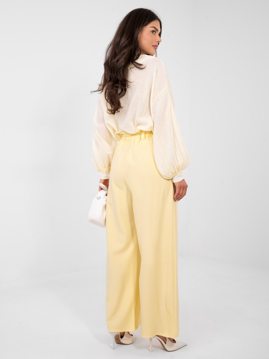 Elegant yellow wide-leg trousers with belt
