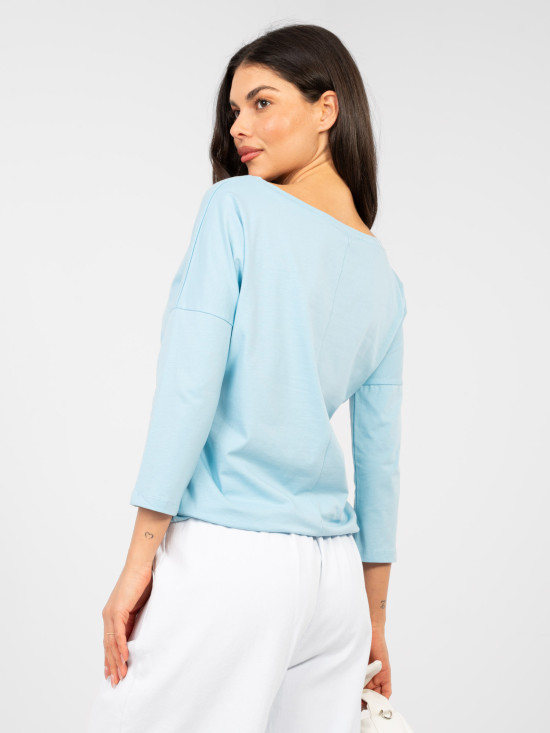 Light blue cotton blouse with 3/4 sleeves and tie detail