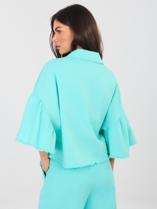 Short denim jacket with ruffle in turquoise