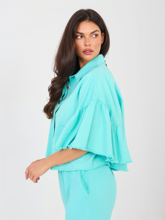 Short denim jacket with ruffle in turquoise