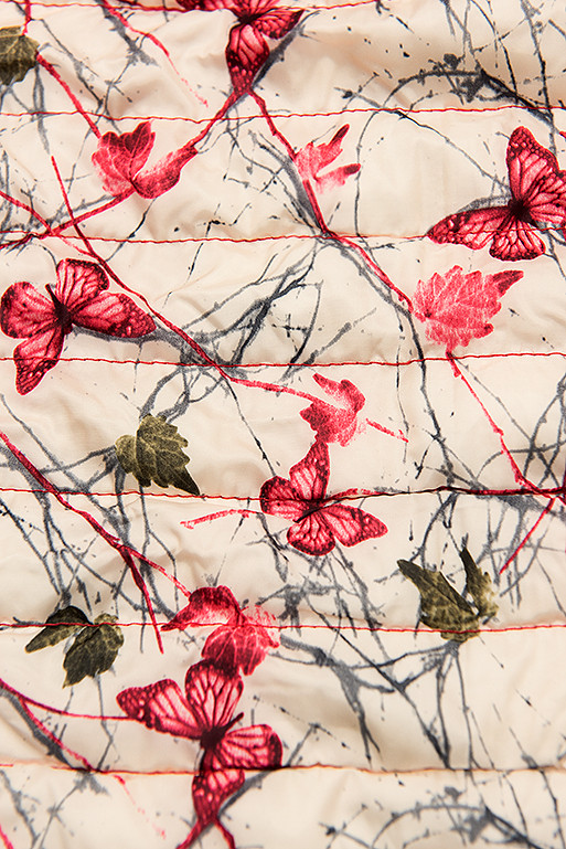 Red puffer jacket with patterned lining