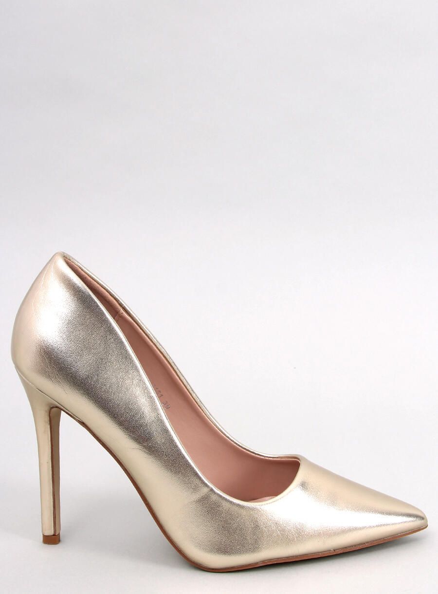Gold pumps on a stiletto heel