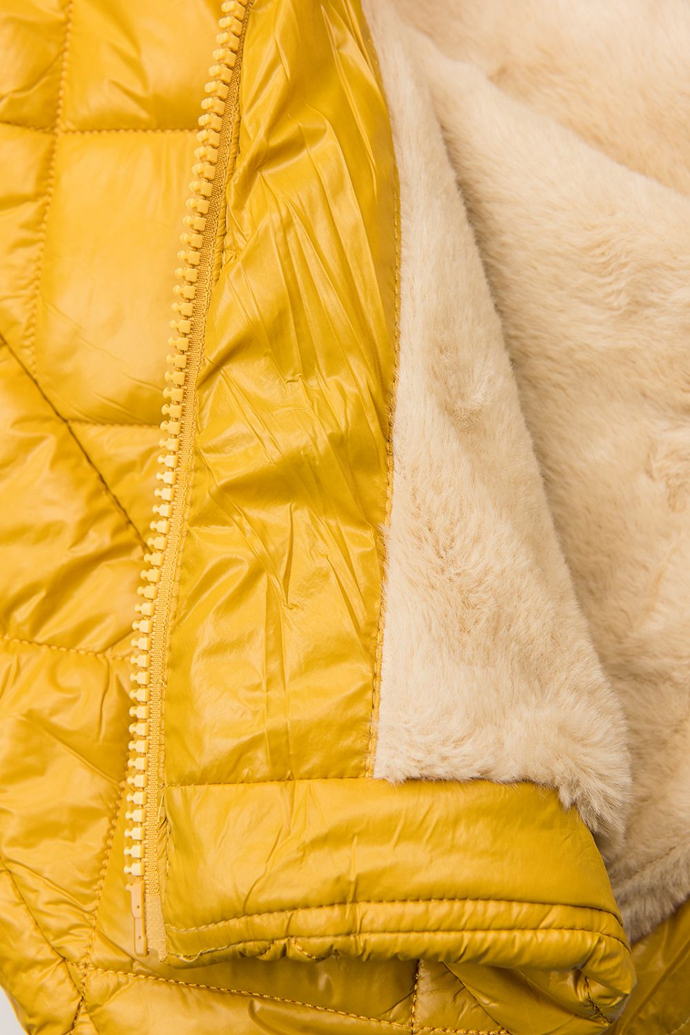 Belted winter jacket in yellow