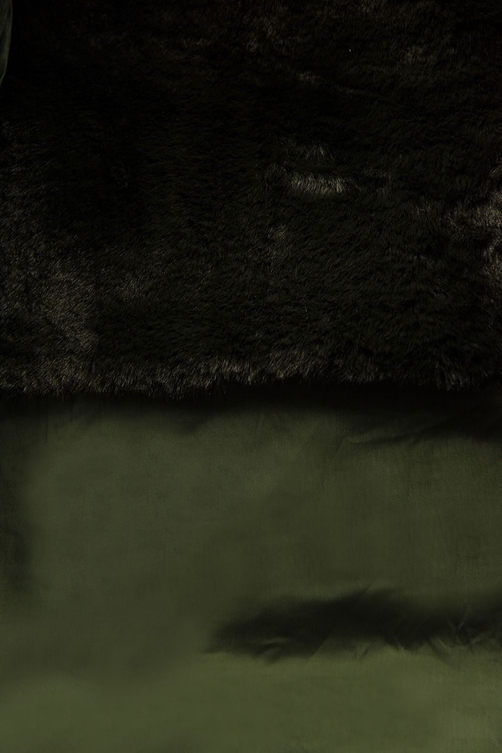 Dark green winter jacket with belt and fur