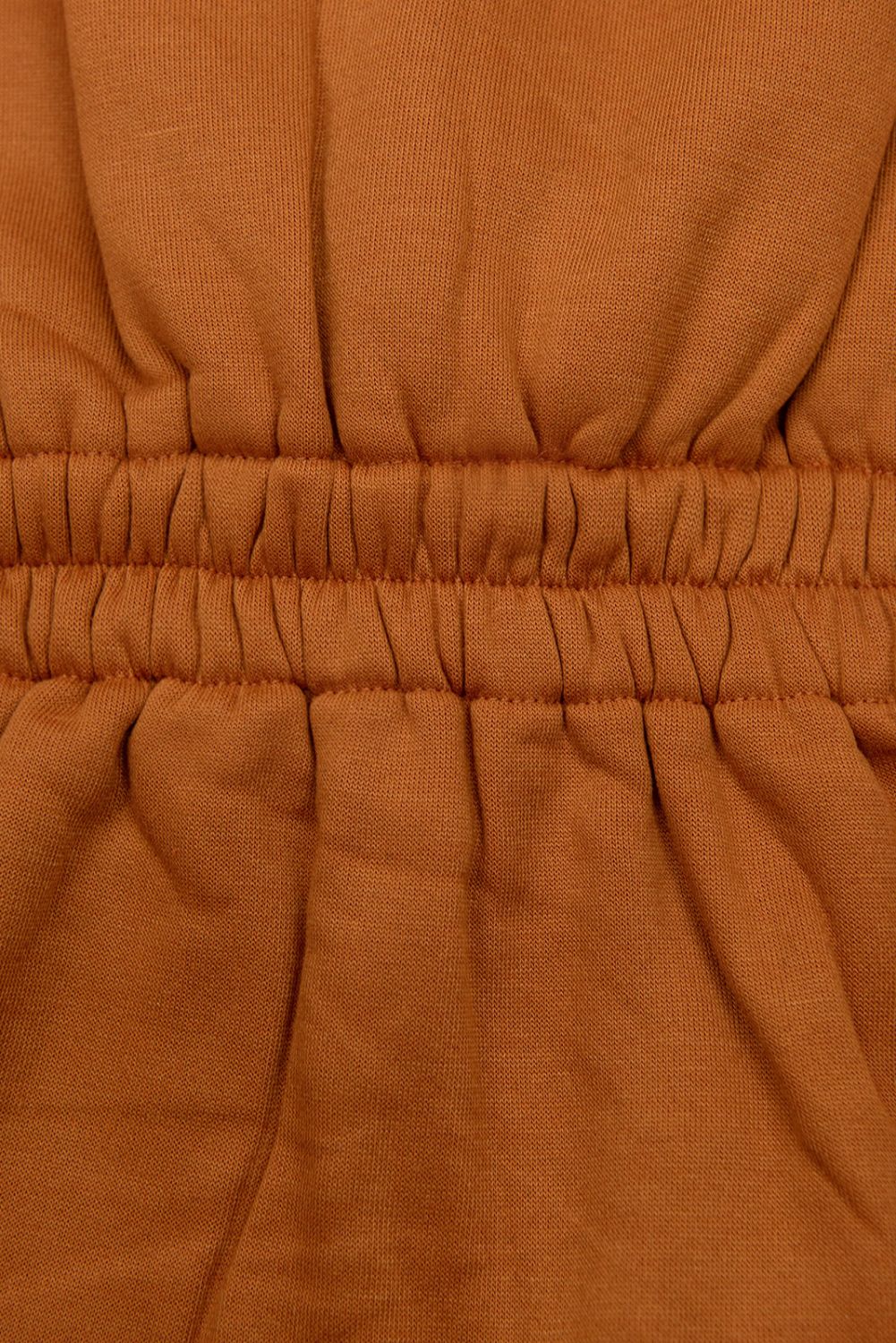 Dark orange elongated hoodie in shaped cut