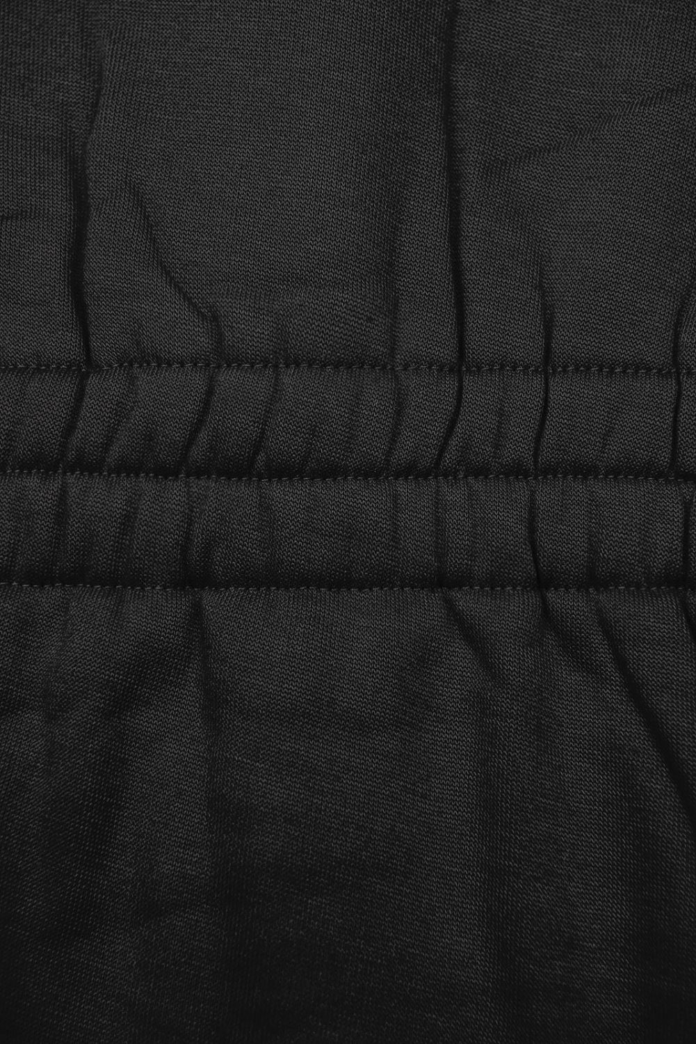 Black elongated hoodie in shaped cut