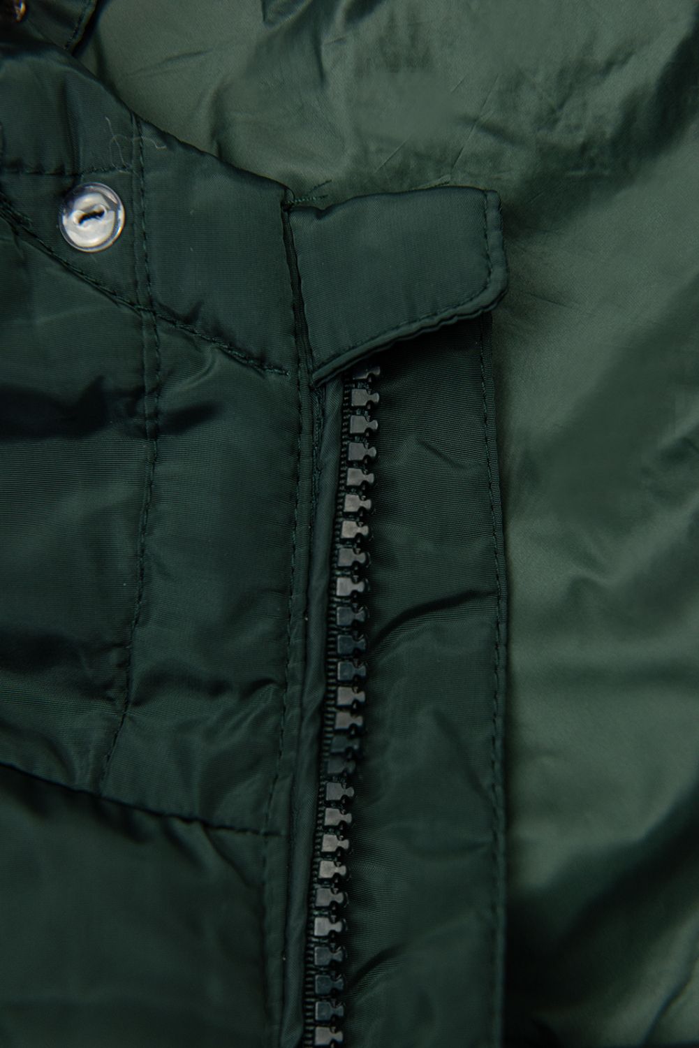 Dark green quilted jacket for autumn/winter