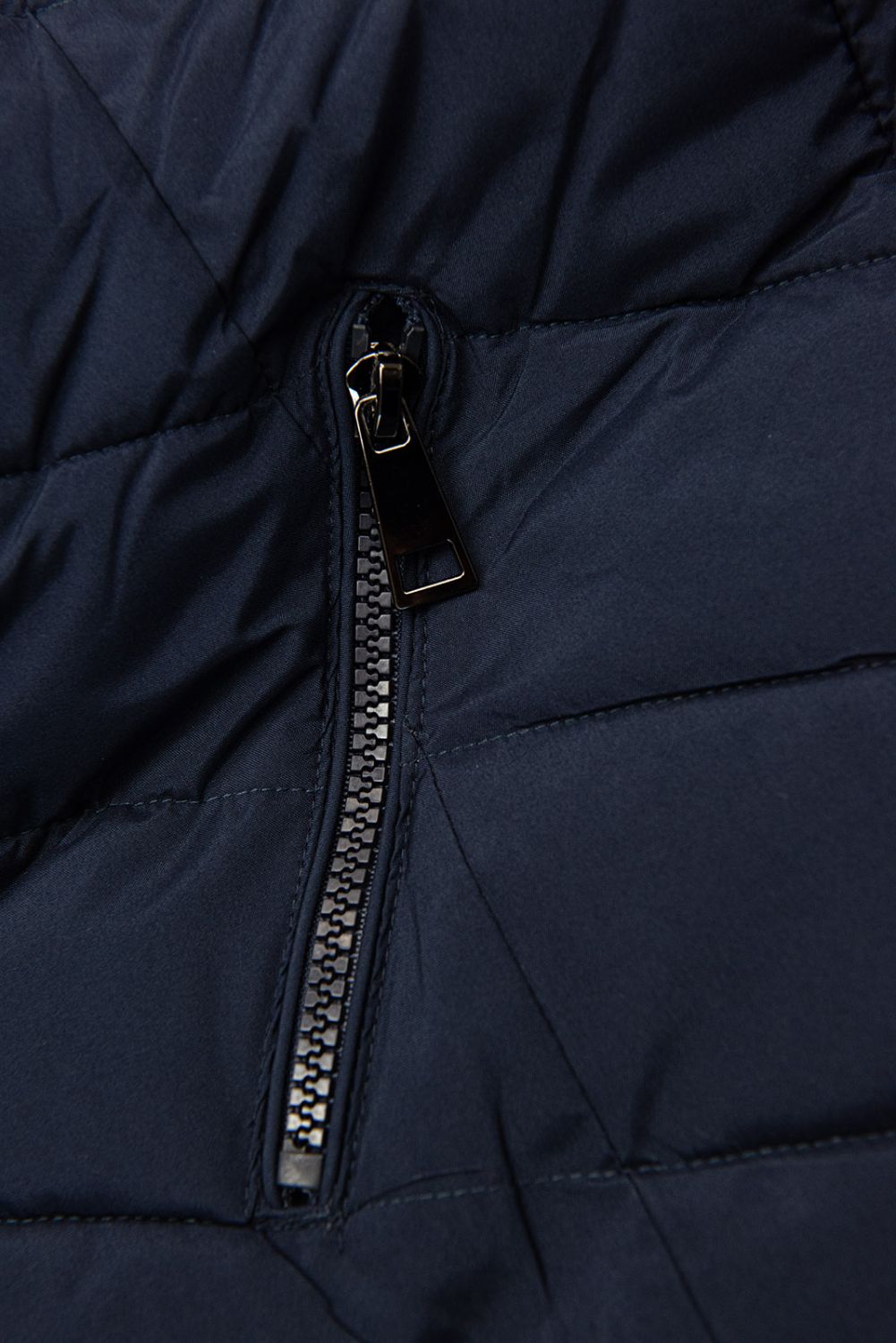 Dark blue winter jacket shaped for wider hips
