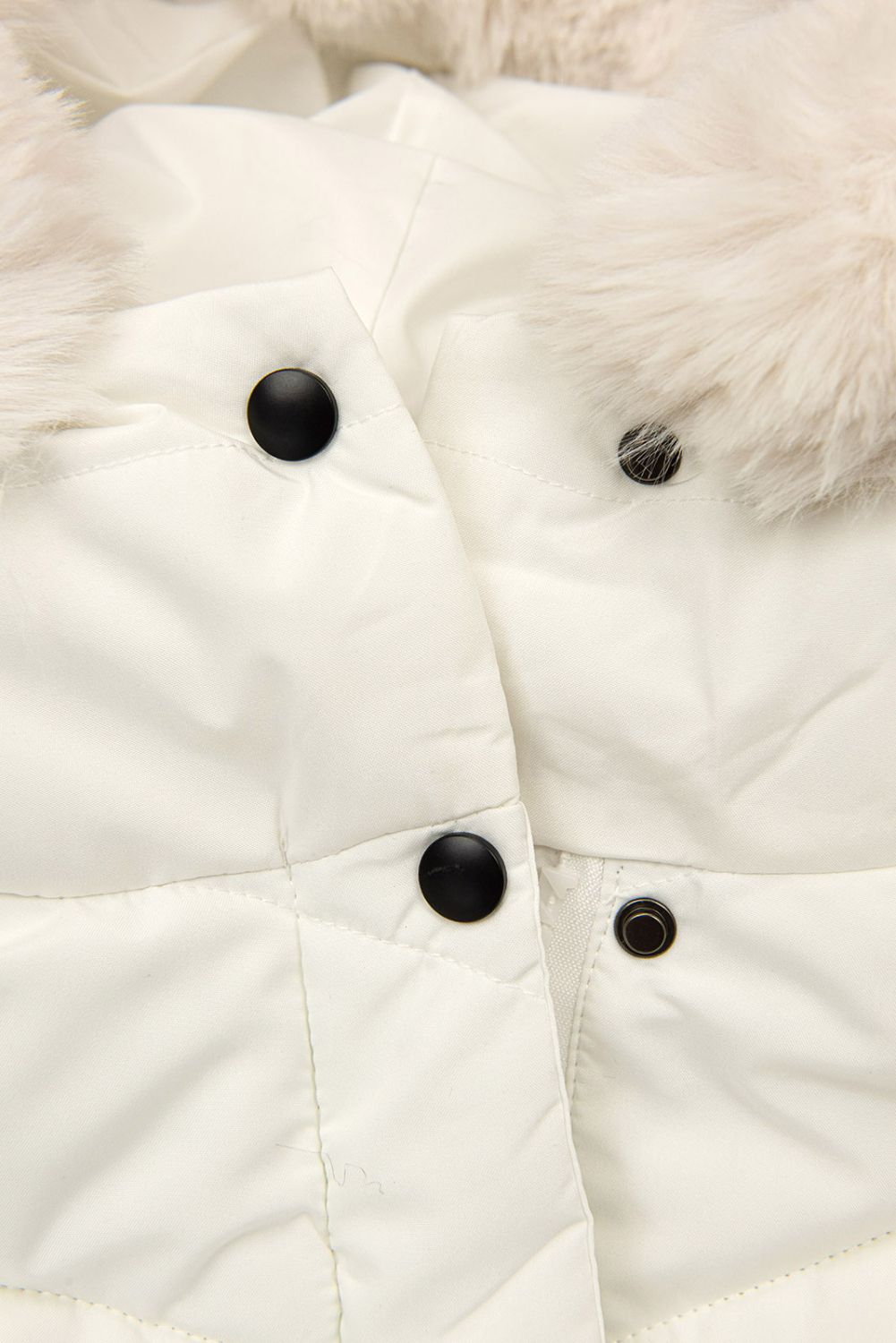 Creamy white winter jacket shaped for wider hips