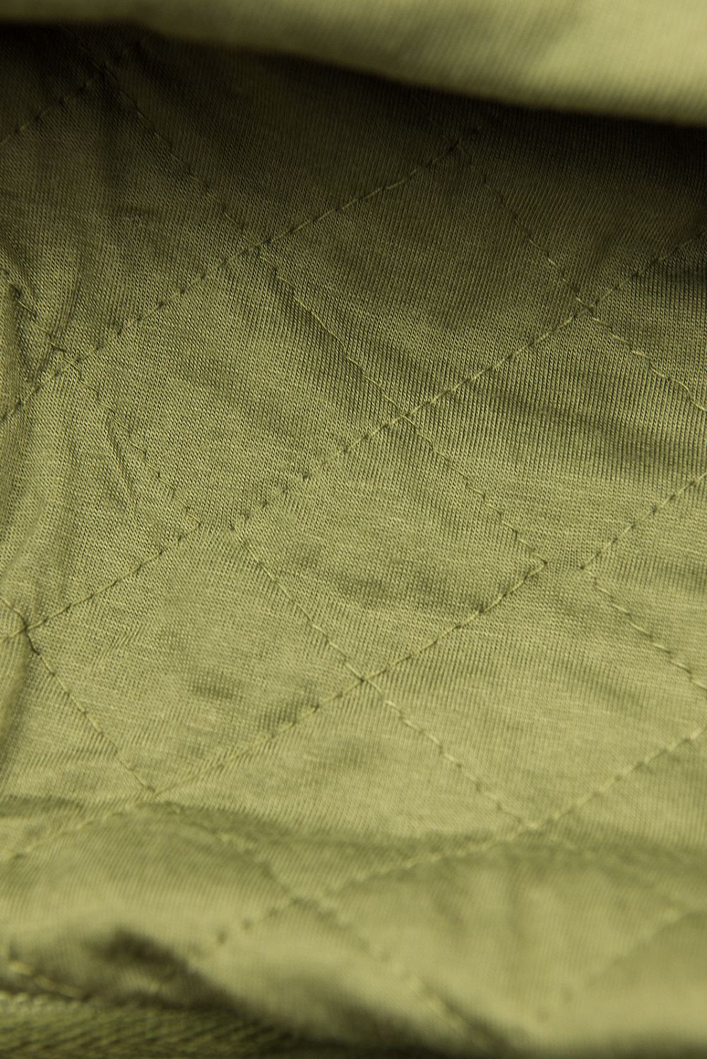 Army green elongated hoodie with quilted details