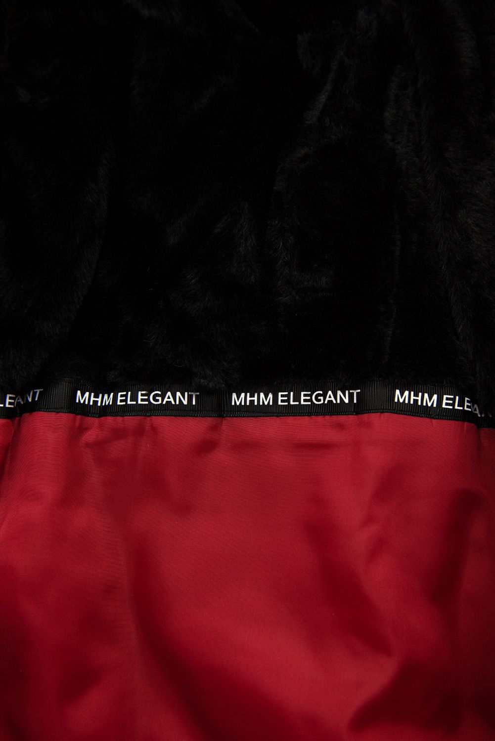 Red parka for winter with black faux fur lining