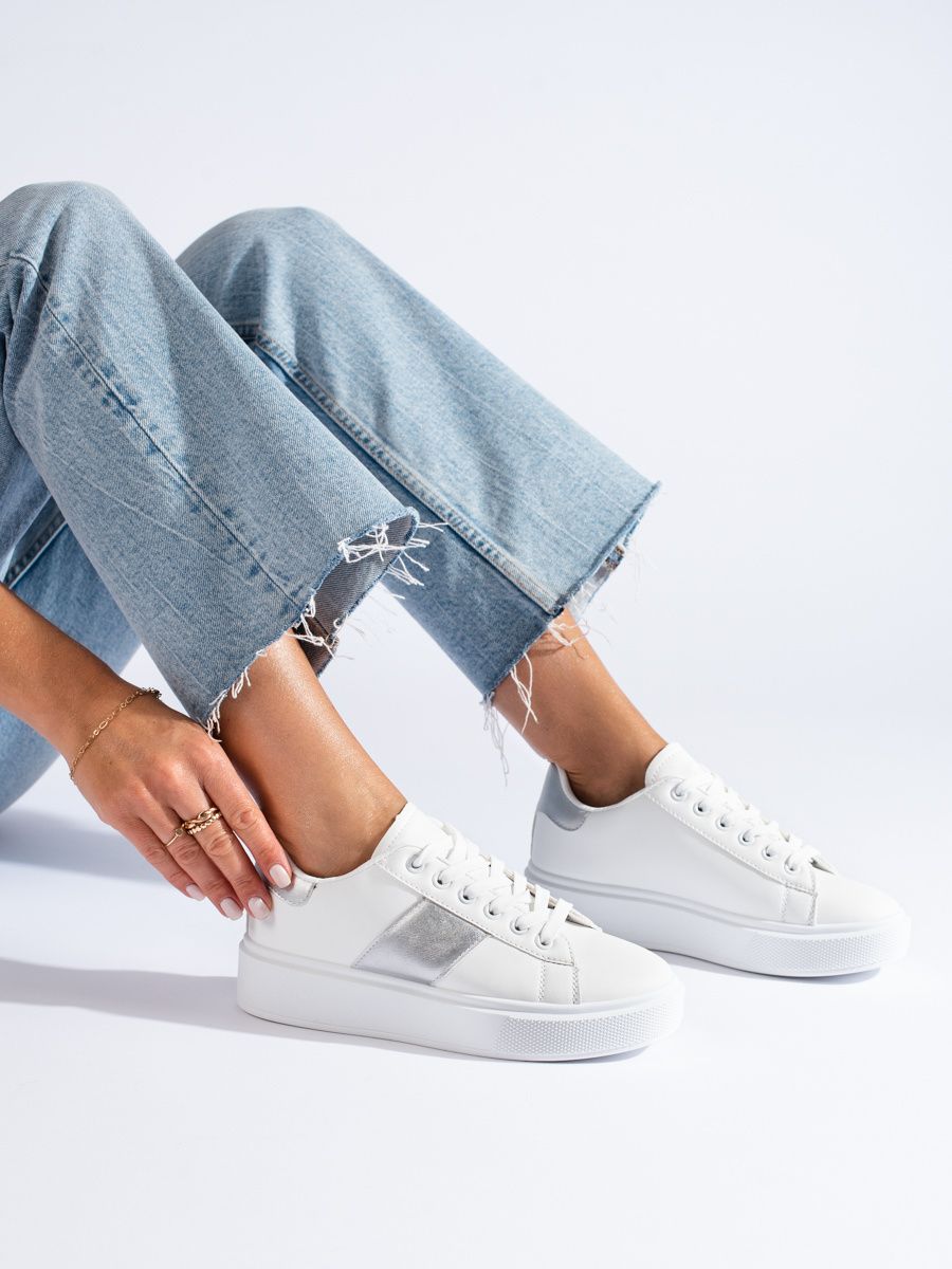 White sneakers with a silver stripe