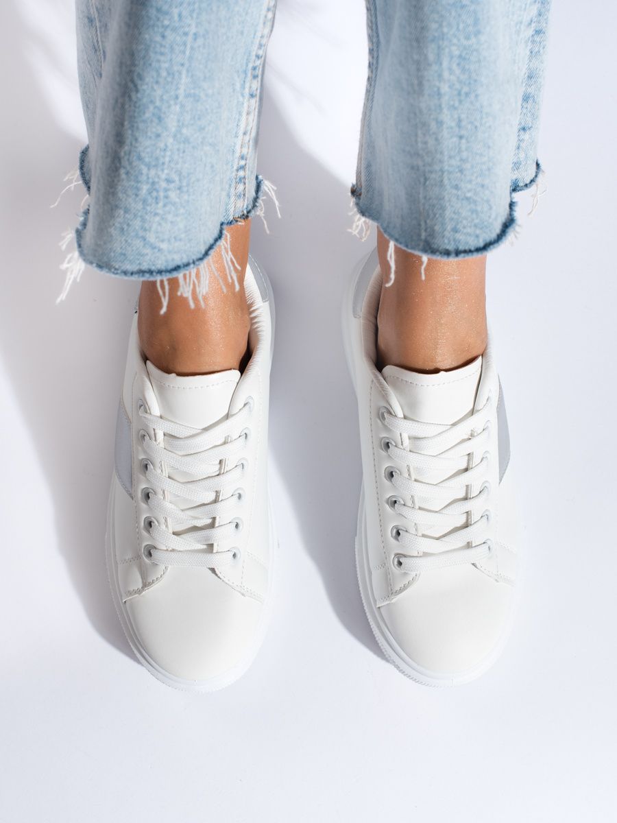 White sneakers with a silver stripe