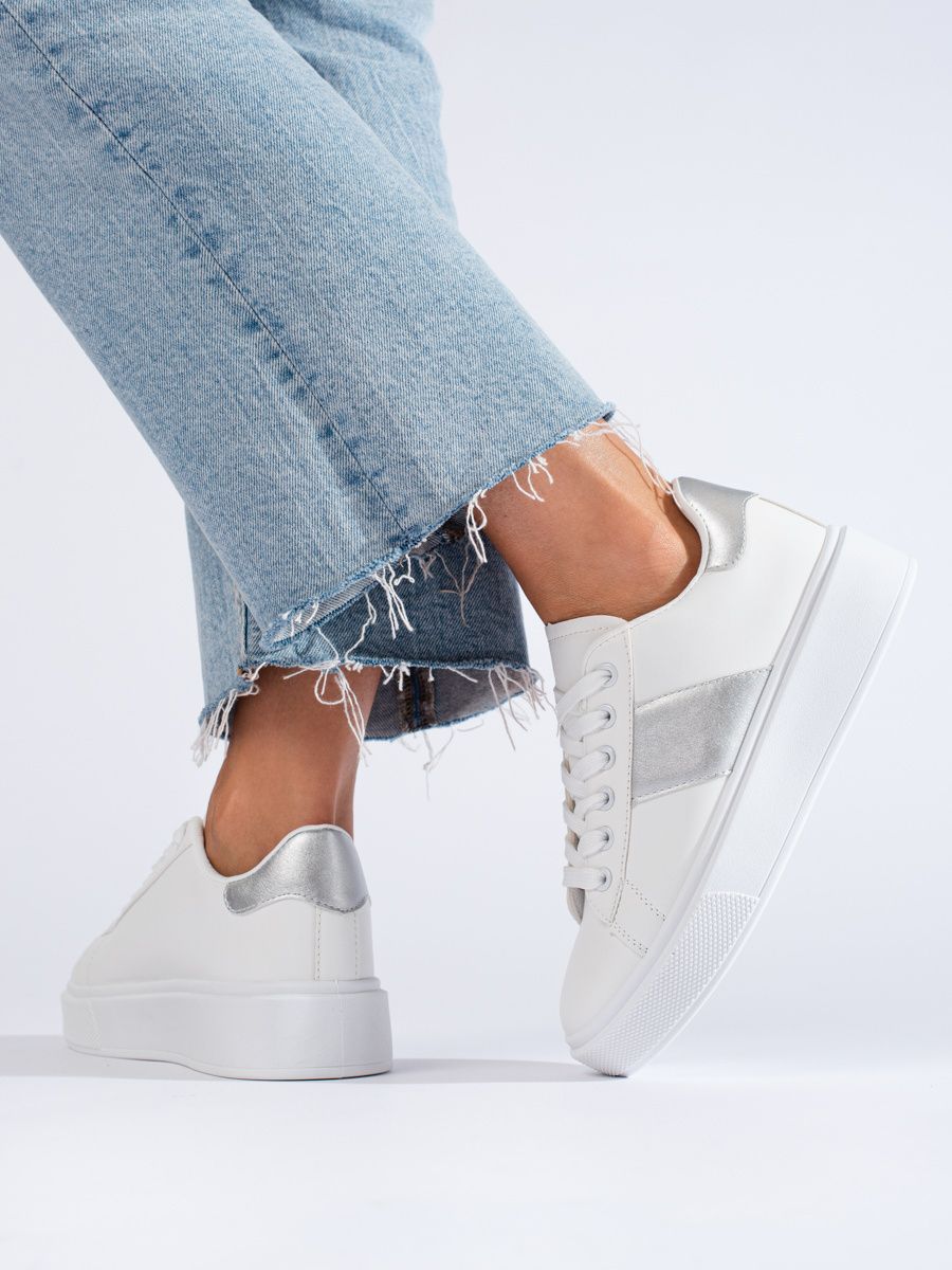 White sneakers with a silver stripe