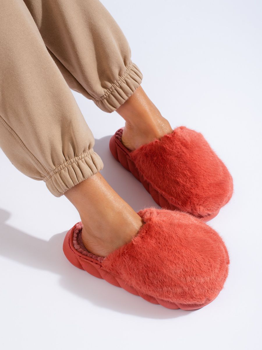 Coral red fur slippers on a thick sole