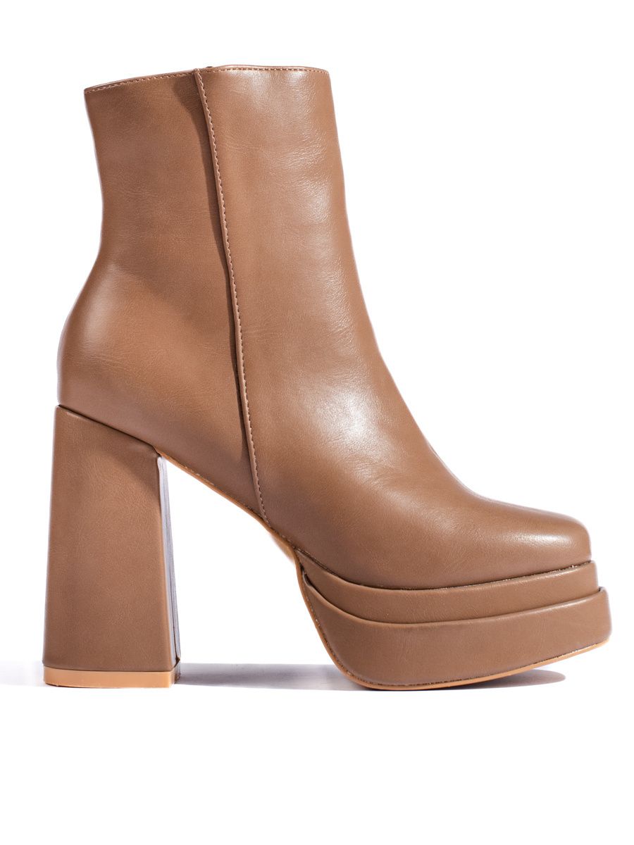 Beige ankle boots with a high heel