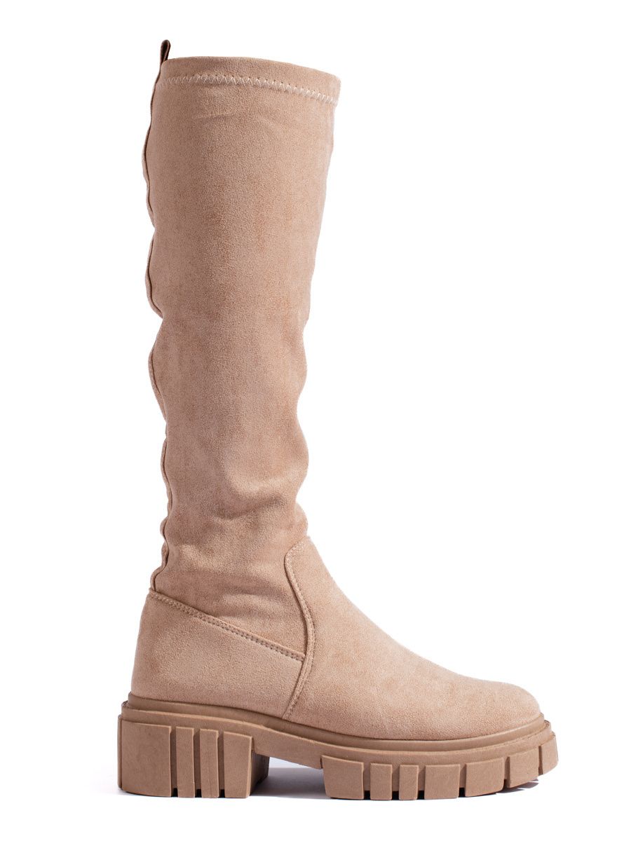 High suede boots with a thick sole beige