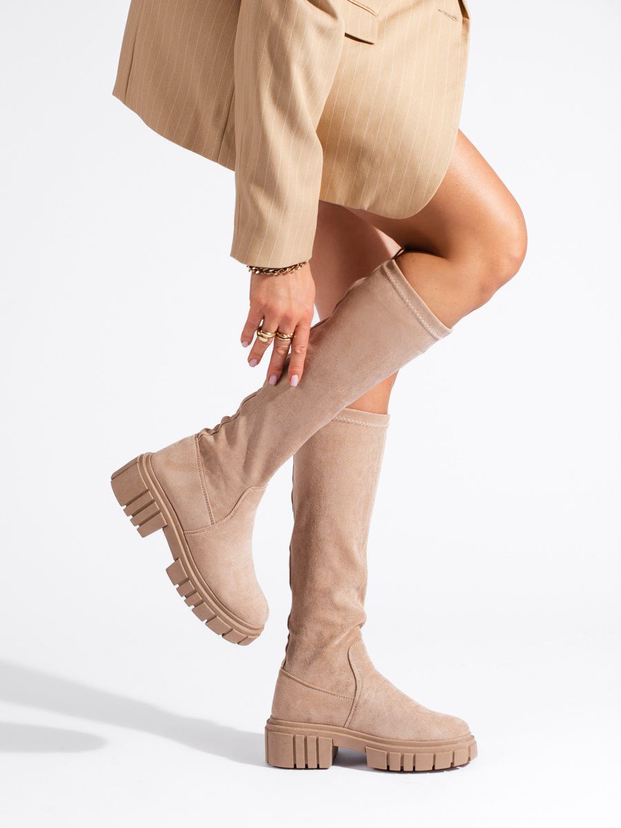 High suede boots with a thick sole beige