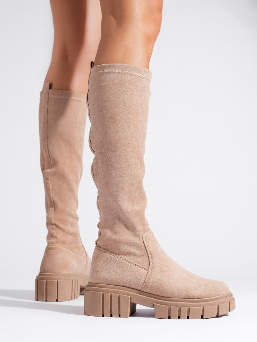 High suede boots with a thick sole beige