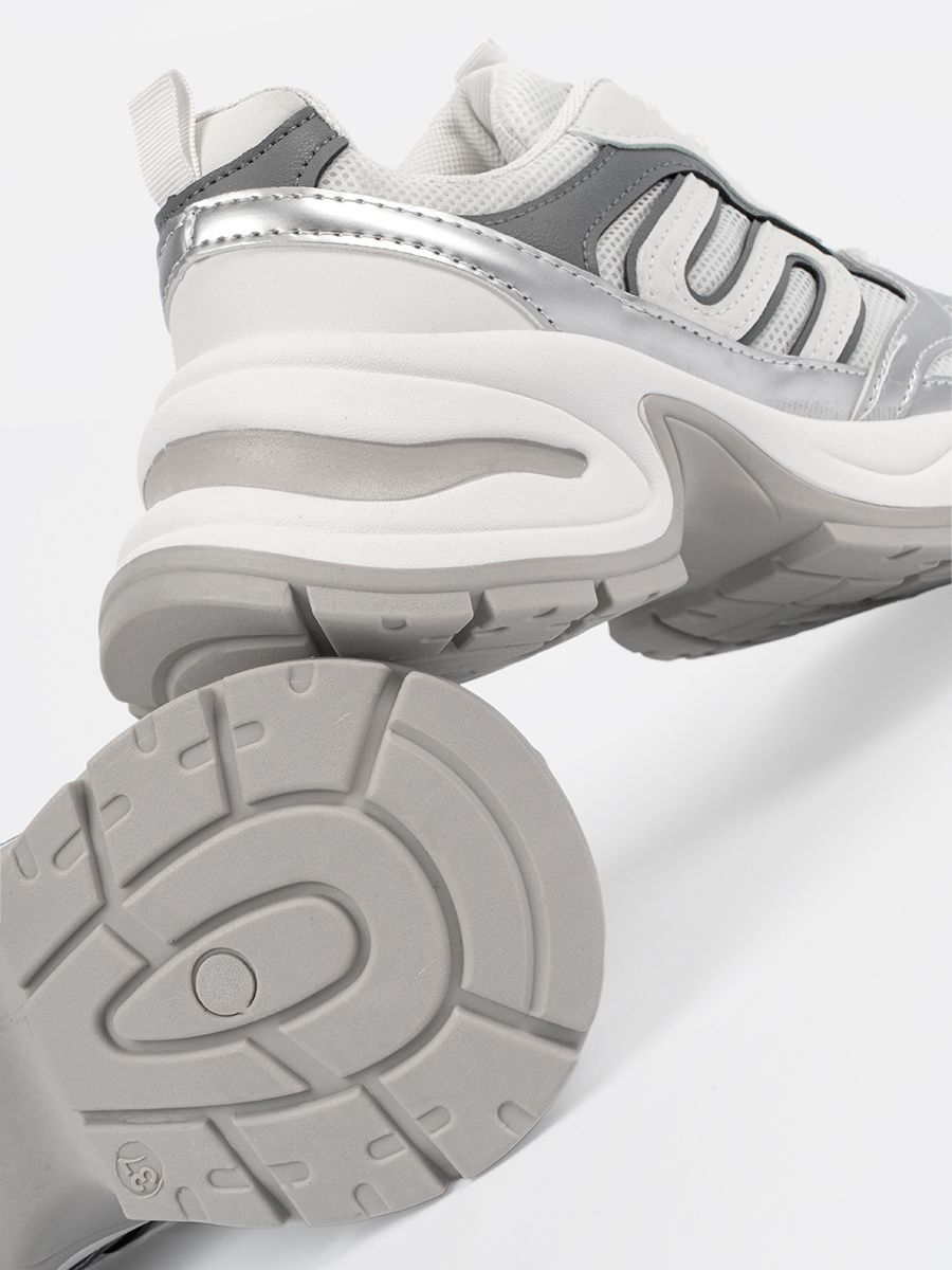 White Sneakers with Silver Accents