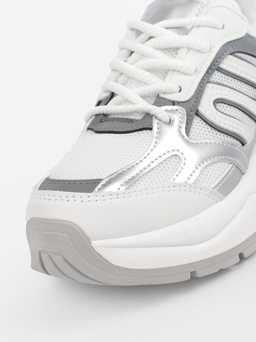 White Sneakers with Silver Accents