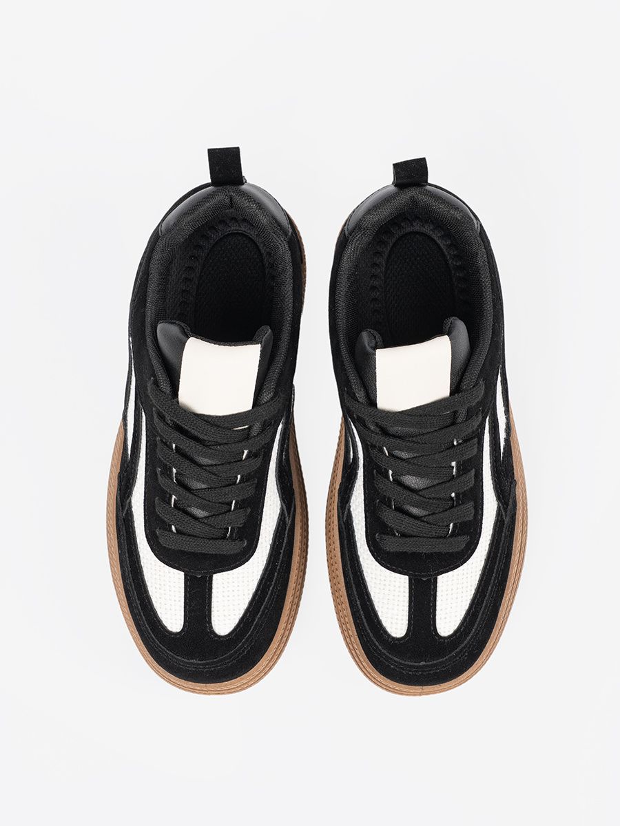 Black Sneakers with White Accents