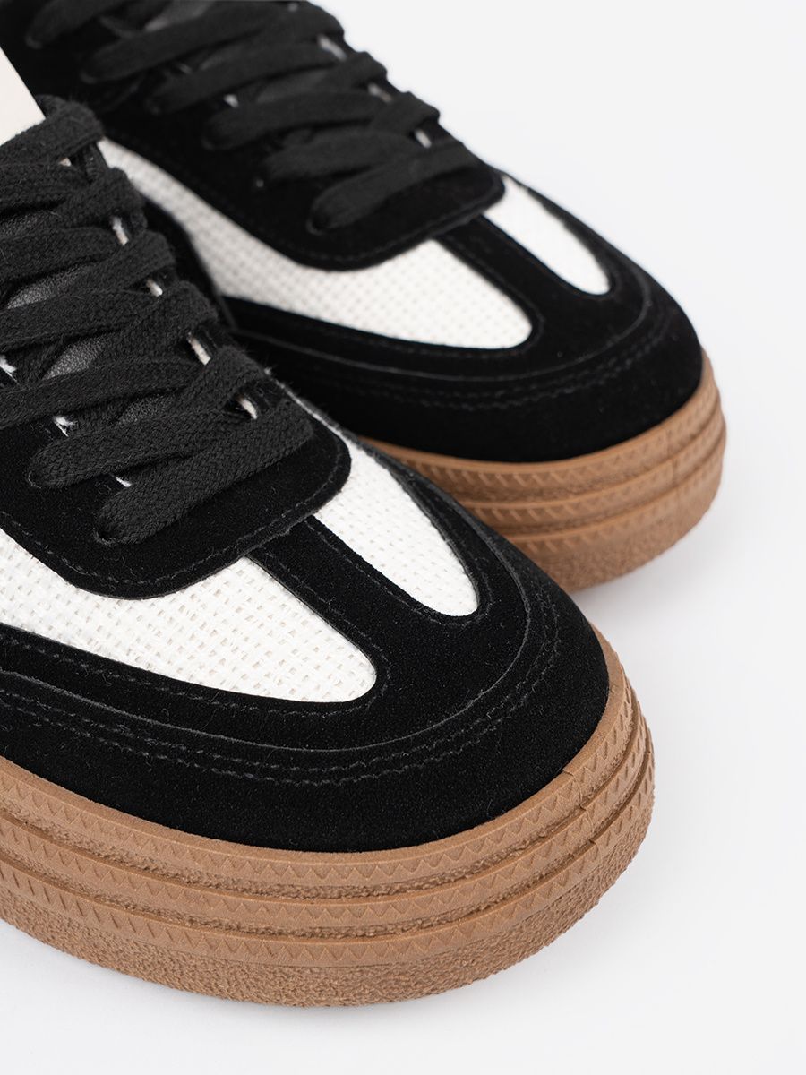 Black Sneakers with White Accents